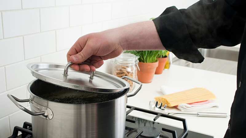 You can use a pan lid to make emptying sauce packets a breeze (stock photo) (Image: Getty Images)