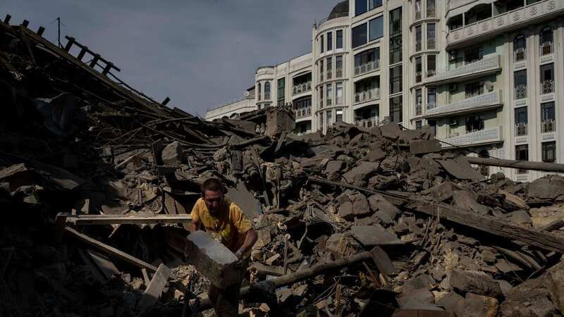 A man works on the rubble of an apartment building destroyed in Russian missile attacks in Odesa, Ukraine (Image: AP)