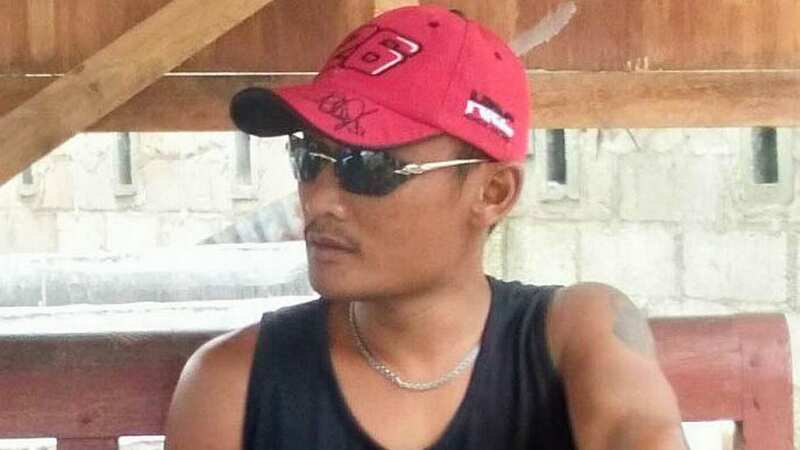 Father feared dead after being attacked by crocodile while swimming with son