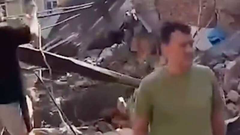 A missile has hit Taganrog, Rostov Oblast, Russia. It has left a huge crater and people trapped under rubble. (Image: taxfreelt/Twitter)