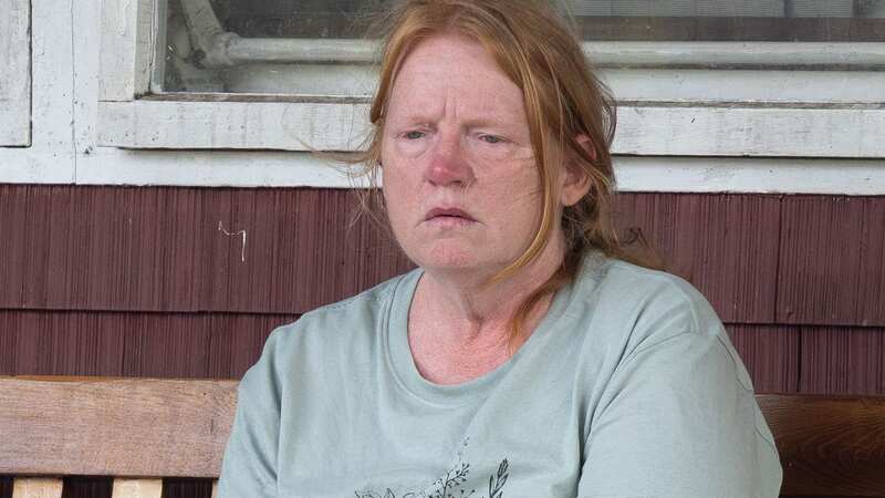 Asa Ellerup, 59, said her two children are crying themselves to sleep after her estranged husband was arrested and their home raided (Image: MEGA)
