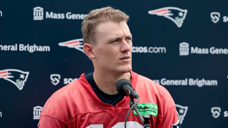 NFL players Mac Jones and Bailey Zappe are competing for the starting QB spot at the New England Patriots (Image: Winslow Townson/Getty Images)