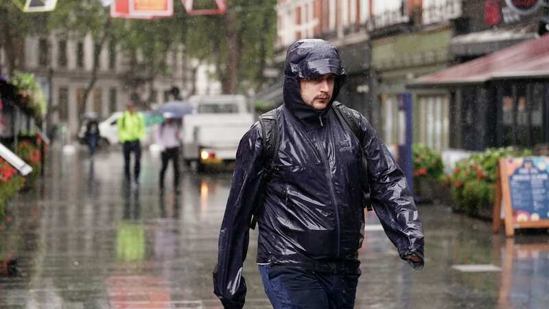 British summer washout sees cars submerged in streets after heavy rain