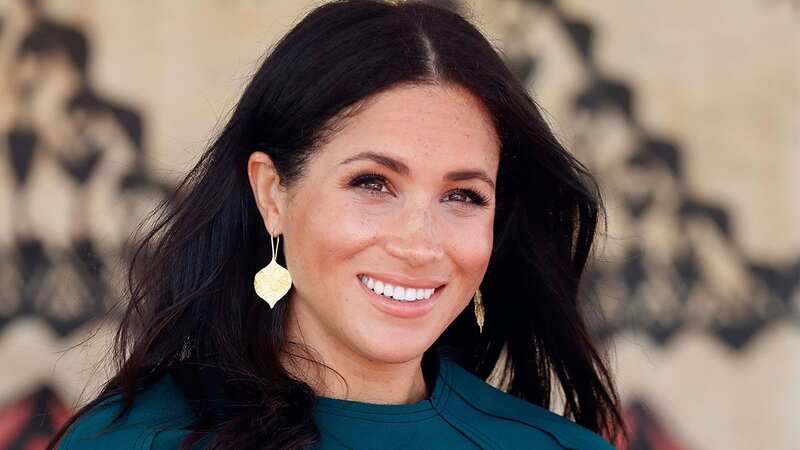 Meghan Markle uses her body language to give a telling sign about her marriage (Image: GETTY)