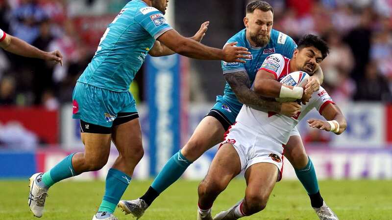 Blake Austin tackles St Helens
