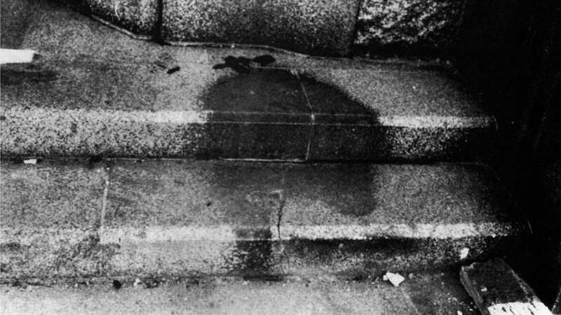 The shadow of a person on steps to a bank (Image: Universal Images Group via Getty Images)