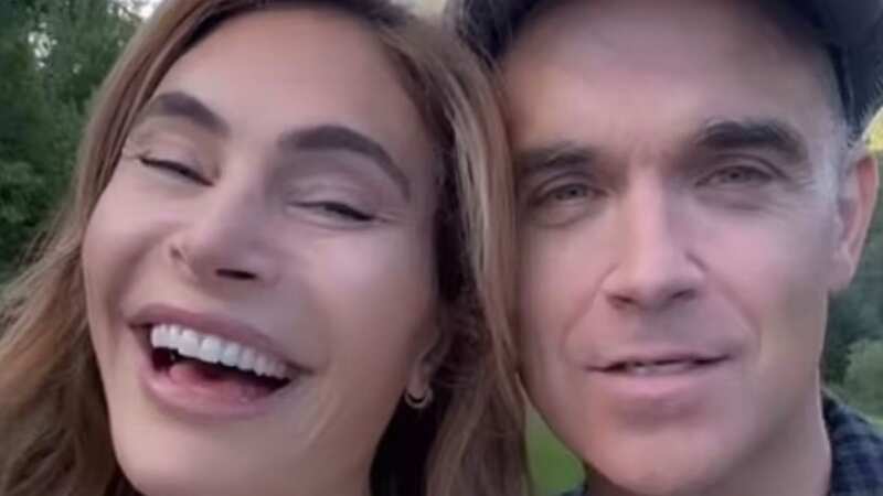 Ayda Field and Robbie Williams look loved-up during family getaway as they celebrate their 13th wedding anniversary (Image: Instagram)
