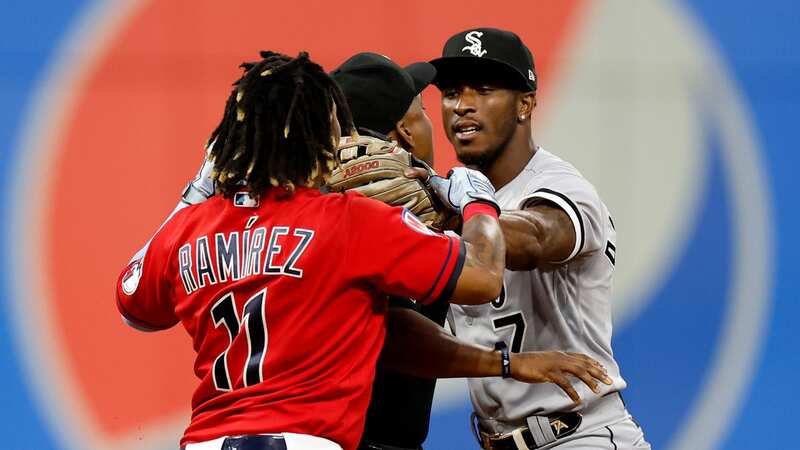 Jose Ramirez #11 of the Cleveland Guardians and Tim Anderson #7 of the Chicago White Sox start a fight