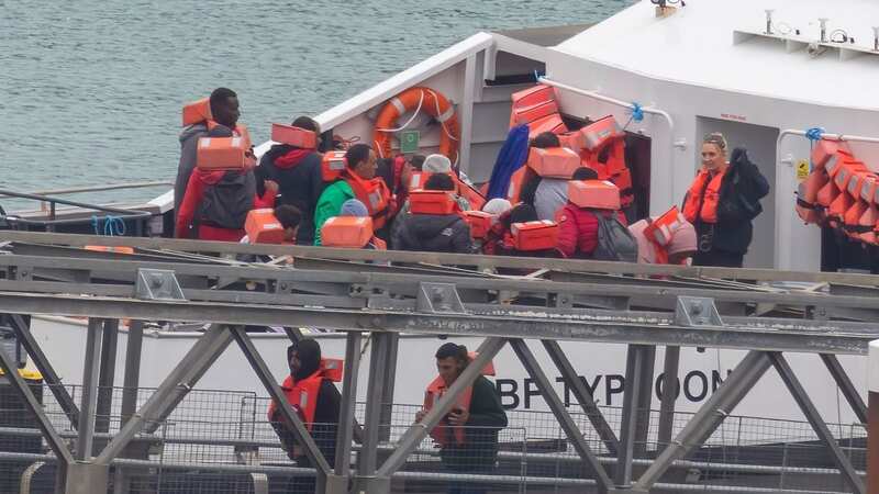 Six people die and dozens rescued after boat carrying migrants sinks in Channel