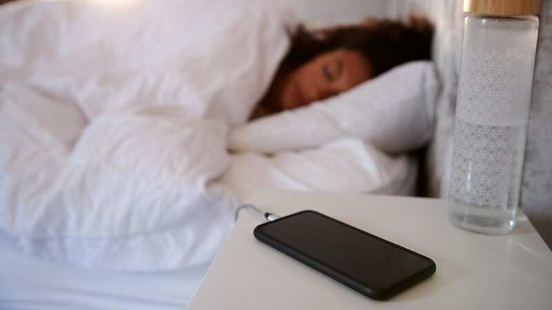 You should never sleep on your phone while it