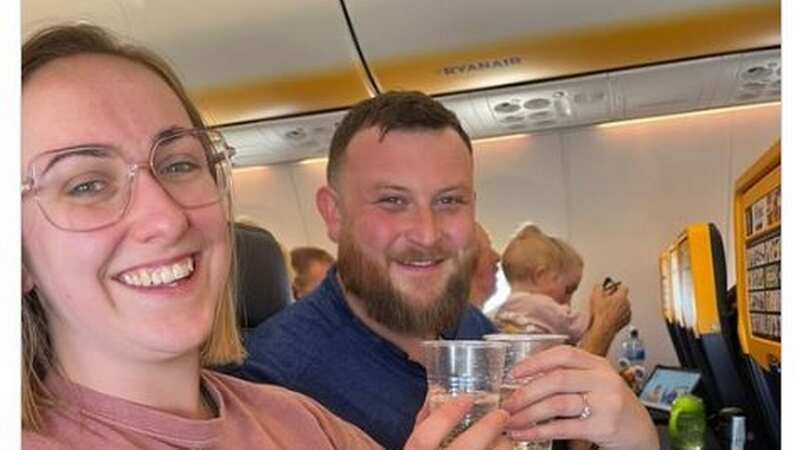 Leah-Lou and Lee got engaged on the plane (Image: Ryanair/ItsJustLeeHere/Twitter)