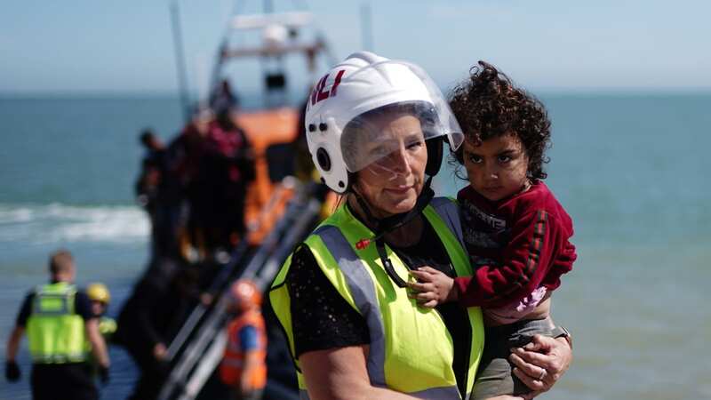 Child among those saved by the RNLI (Image: PA)