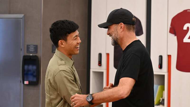 Liverpool boss Jurgen Kopp and new signing Wataru Endo (Image: Andrew Powell/Liverpool FC via Getty Images)