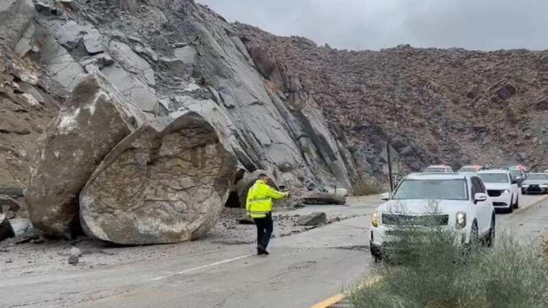 Tropical Storm Hilary causes chaos as huge boulder crashes onto busy road