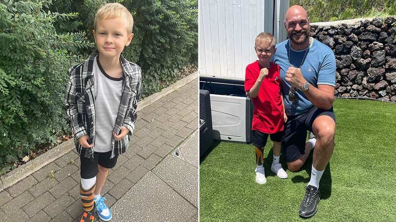 Finley Williams, eight, poses for a picture with boxing icon Tyson Fury (Image: @katieandfinleyx / CATERS NEWS)