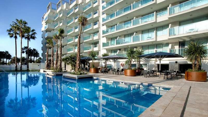 A tourist on a balcony in Magaluf (file photo) (Image: Internet Unknown)