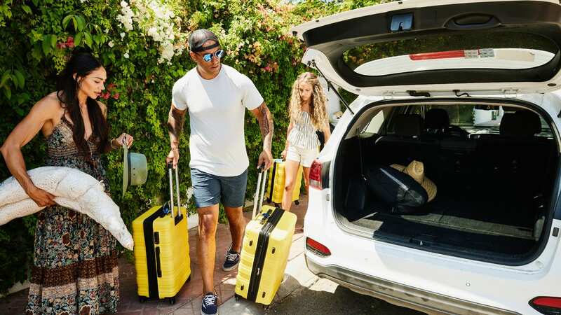 The relative invited herself and booked a flight (stock photo) (Image: Getty Images)