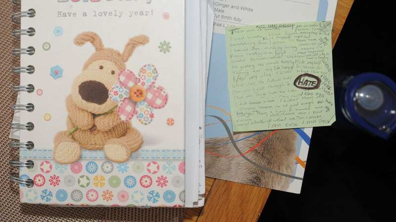The front of a diary, along with a Post-it note which was found inside the diary at Lucy Letby
