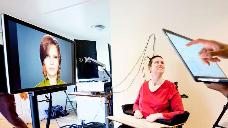 Ann, 48, suffered her brainstem stroke 18 years ago (Image: Noah Berger / SWNS)