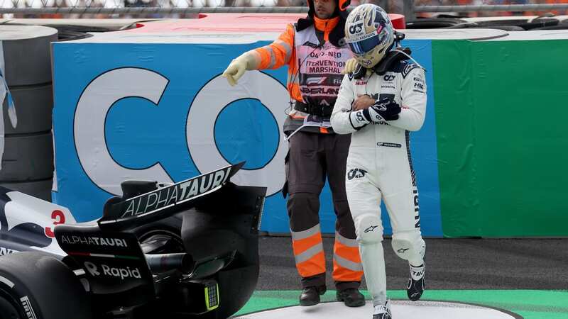 Daniel Ricciardo held his wrist in agony after the crash on Friday (Image: Getty Images)