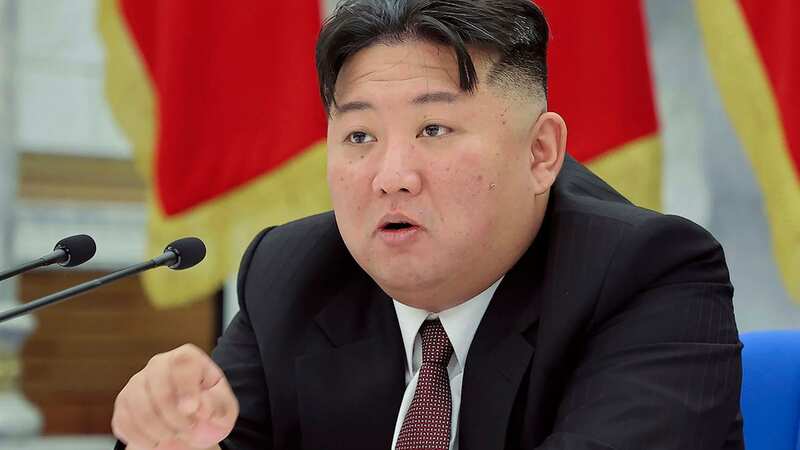 Kim Jong-un cuts a ribbon at an official ceremony in Pyongyang, North Korea (Image: Credit: Pen News)