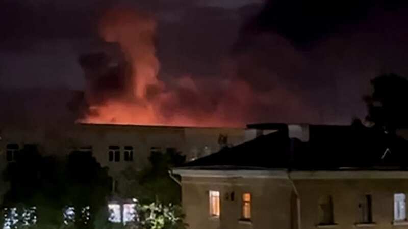 An explosion lights up the sky during a drone attack on an airport in Pskov (Image: TELEGRAM / @MV_007_PSKOV/AFP via)
