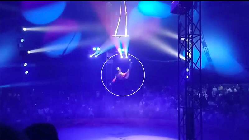 Moment trapeze artist plunges 16ft during circus as children in audience scream