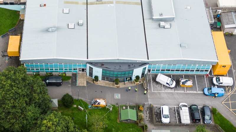Workmen at a school in Bradford (Image: Lee McLean/SWNS)