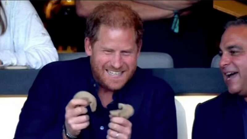 Prince Harry was spotted with a smile at the LAFC game (Image: Apple TV)