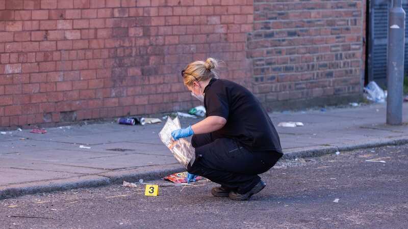 Police at the scene of the stabbing this morning (Image: Liverpool Echo)