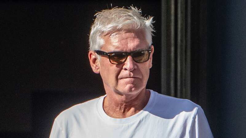 Phillip Schofield looks glum outside London pub as Holly Willoughby returns to This Morning (Image: SplashNews.com)