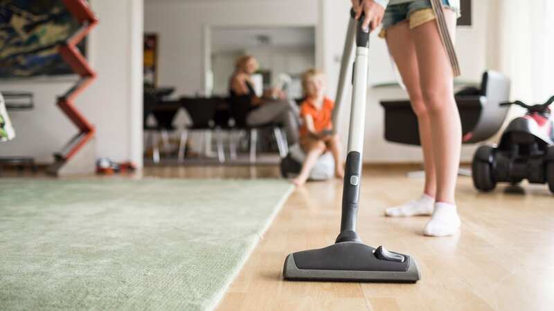 Cleaning is an oddly satisfying way to pass the time for more than half of parents (Image: Getty Images)
