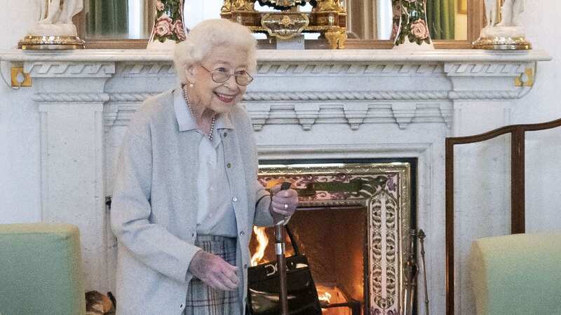 The photos depict Queen Elizabeth II in the green Drawing Room at Balmoral (Image: PA)