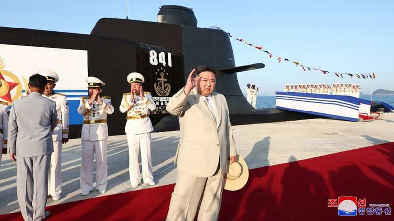 North Korean leader Kim Jong Un during the launch (Image: KCNA/UPI/REX/Shutterstock)