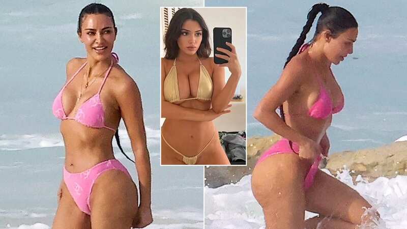 Kim Kardashian opted for a revealing pink two-piece