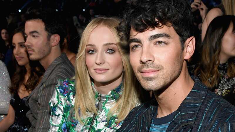 Sources claim Sophie reportedly struggled after giving birth and Joe wasn