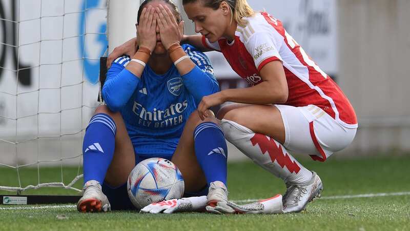 Manuela Zinsberger of Arsenal is consoled by Cloe Lacasse after the Gunners lost their Champions League qualifier on penalties