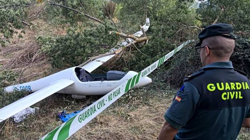 Police at the crash scene in the Pyrenees (Image: SOLARPIX.COM)