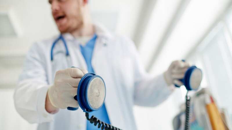 A defibrillator should be used when a person is in cardiac arrest (Image: Getty Images/iStockphoto)