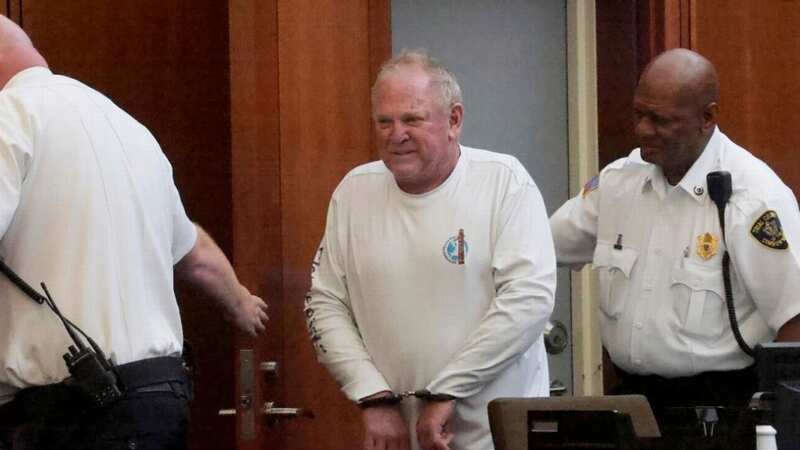 Dr. Scott Anthony Burke, 69, pleaded not guilty to drug and weapons trafficking charges in court Wednesday (Image: Boston Globe via Getty Images)