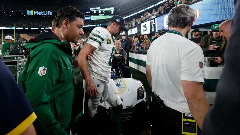 Aaron Rodgers limped off following a sack that has left the quarterback with a suspected Achilles injury (Image: AP)