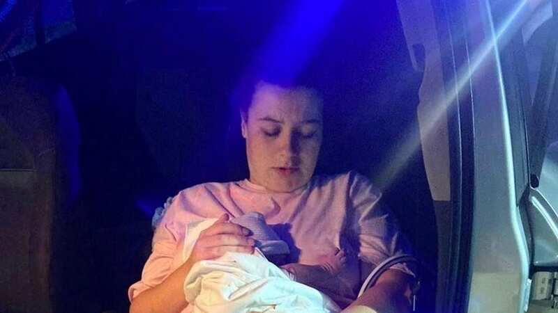 Lorien with Harper-Rae after giving birth (Image: Lorien Williams / SWNS)