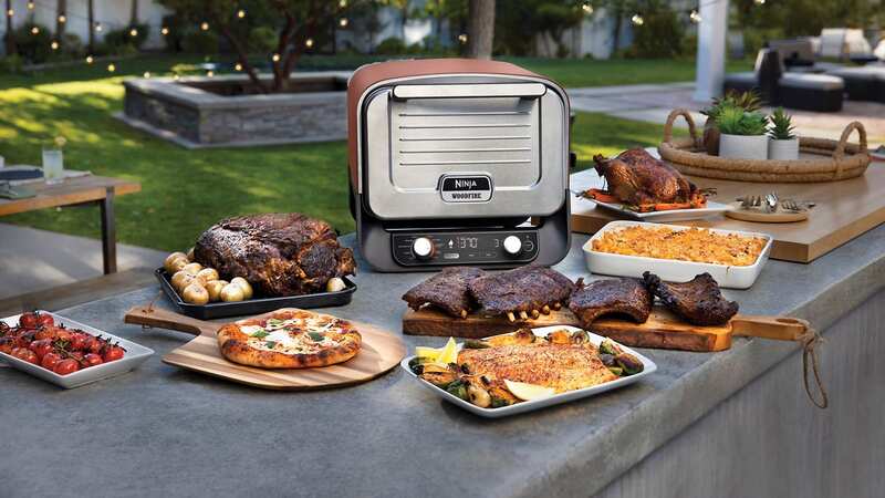 Ninja has unveiled their versatile Outdoor Oven which can cook pizzas, roast meat and even be used as a smoker. (Image: Ninja)