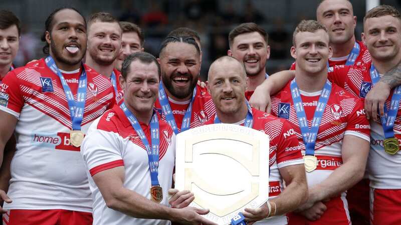 St Helens Head Coach Kristian Woolf (left) and James Roby pose with the League Leaders 2022 Shield. (Image: PA)