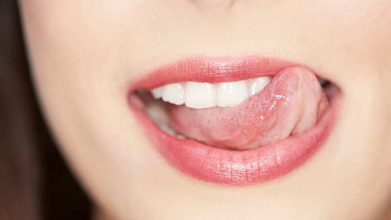 A healthy tongue should be smooth, supple, slightly moist and pale red in colour. (Image: Getty Images)