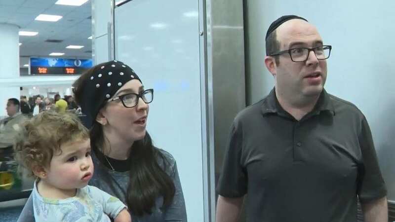 Family kicked off flight after passengers complain they 