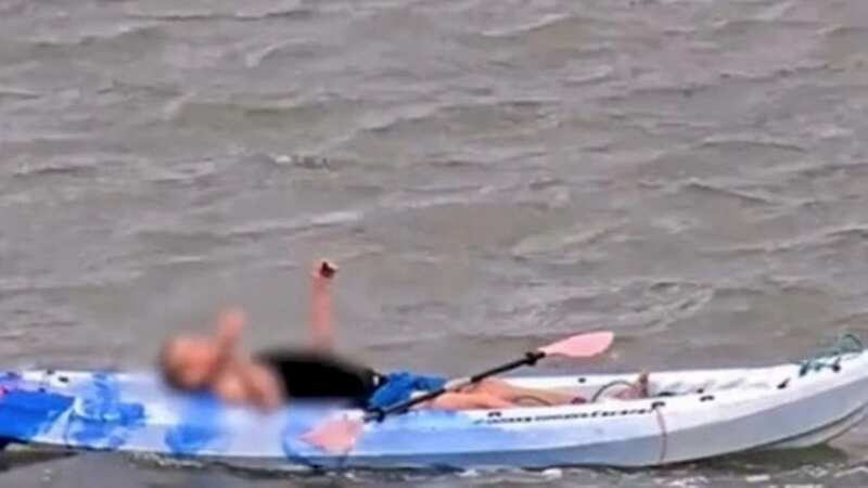 Police received a panicked call after the kayaker was spotted struggling in the water (Image: 7 News)