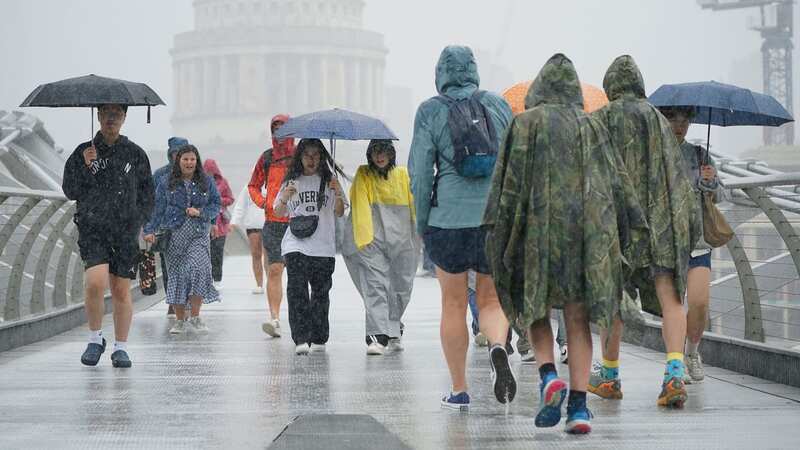 Brits are bracing for heavy downpours over the weekend (Image: PA)