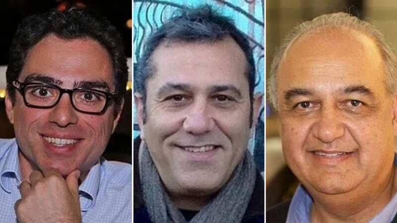 US citizens Siamak Namazi (2L), Emad Sharqi (C) and Morad Tahbaz (R) are greeted upon their arrival at the Doha International Airpor (Image: AFP via Getty Images)