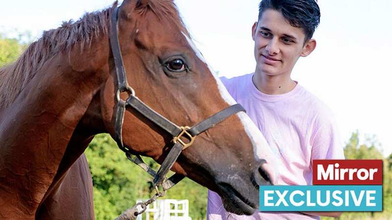 Rhys, 18, with racehorse Live In The Dream (Image: Jonathan Buckmaster)